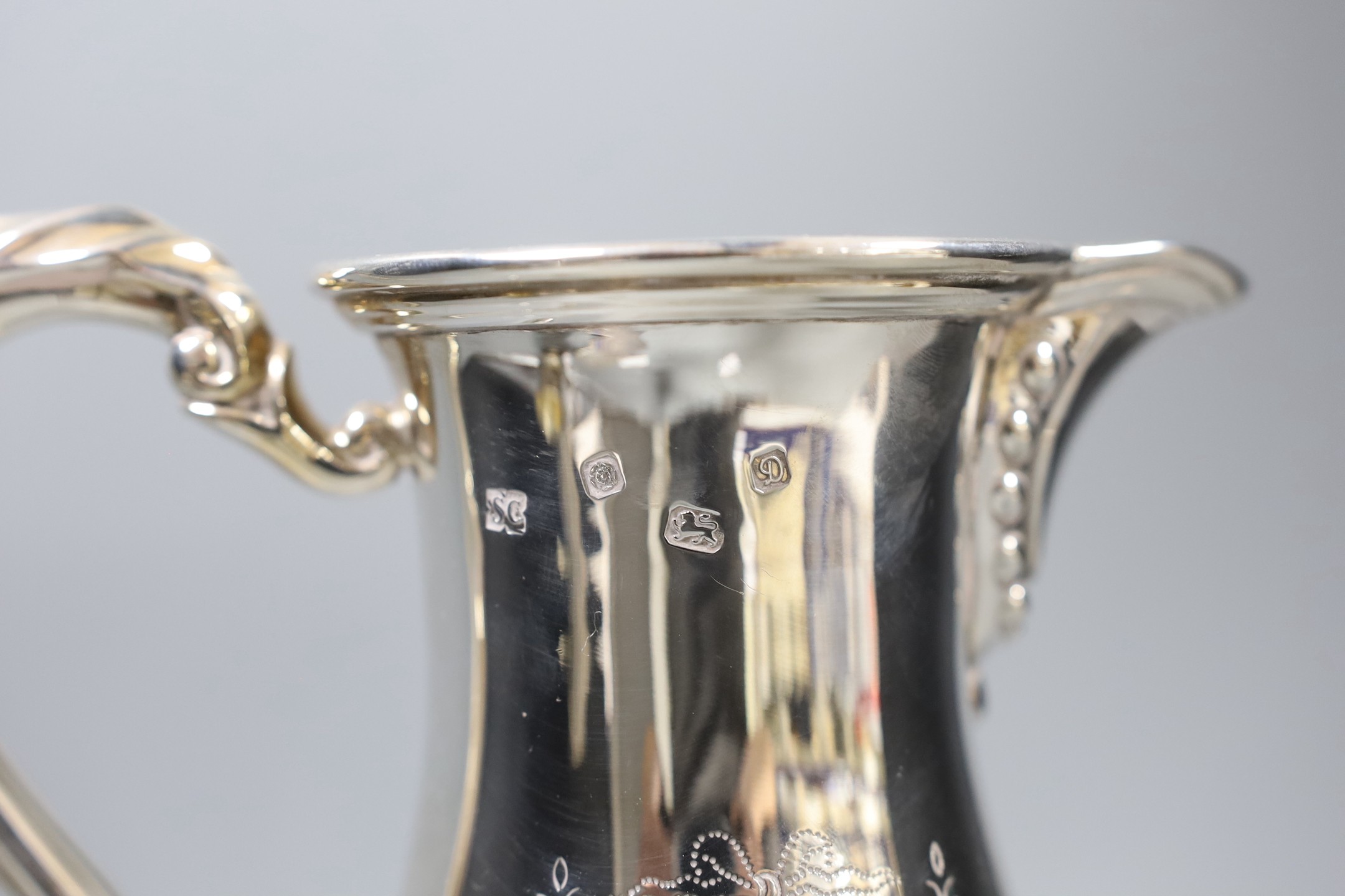 A modern engraved silver water jug, maker, SC, Sheffield, 1971, height 23.8cm